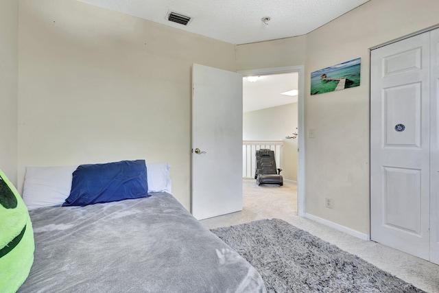 bedroom featuring light carpet