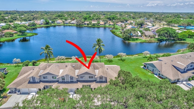 birds eye view of property featuring a water view