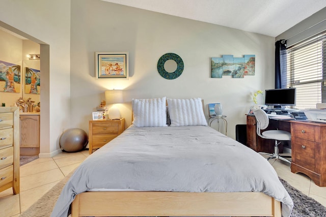 bedroom with light tile patterned flooring