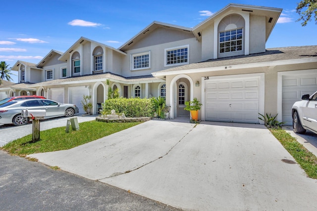 view of front of home with a garage