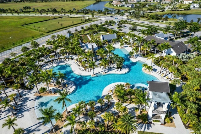 birds eye view of property featuring a water view