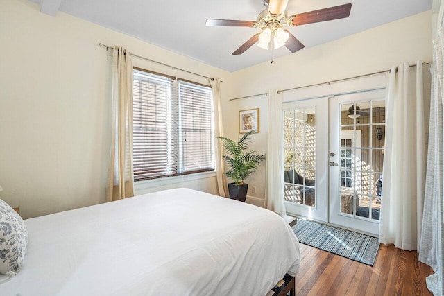 bedroom featuring access to exterior, french doors, ceiling fan, and dark wood-type flooring