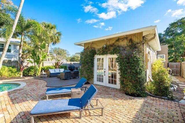 view of patio / terrace with outdoor lounge area and french doors