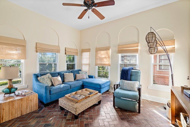 sunroom / solarium with ceiling fan