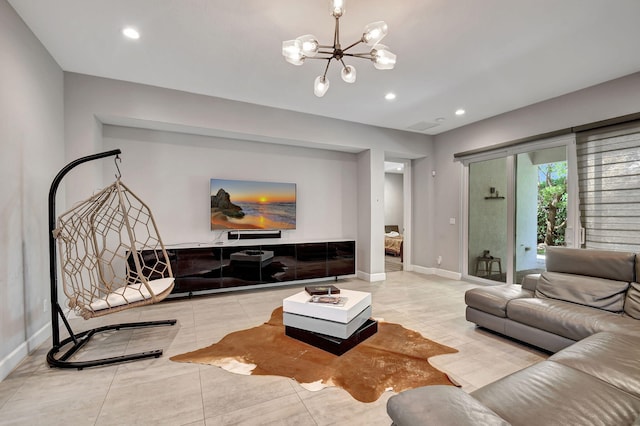 living room with a chandelier and light tile patterned flooring