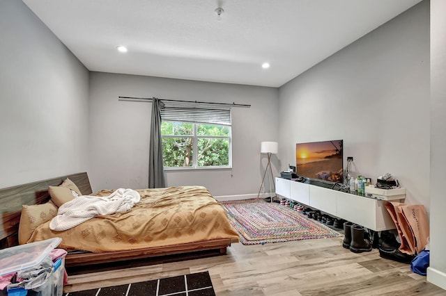 bedroom featuring hardwood / wood-style floors