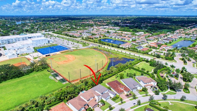 birds eye view of property featuring a water view