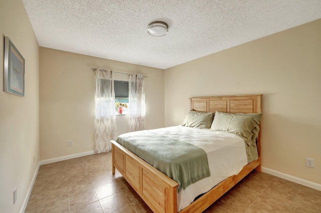 bedroom with a textured ceiling