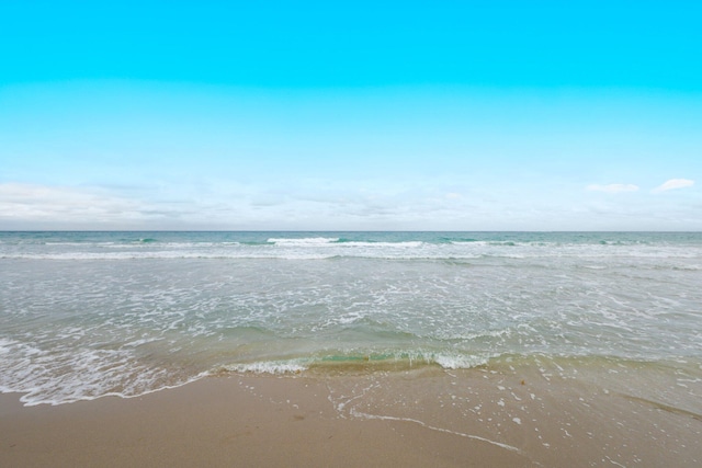 property view of water featuring a view of the beach