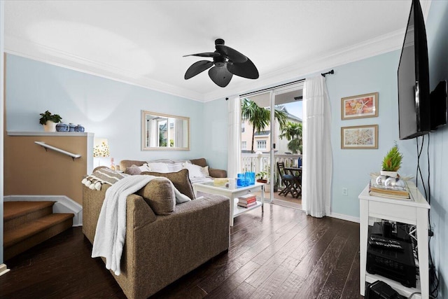 living room with ceiling fan, dark hardwood / wood-style floors, and crown molding