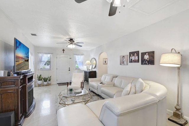 living room featuring ceiling fan