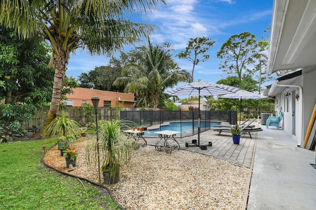 view of swimming pool featuring a patio area