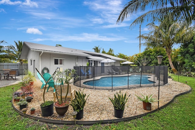 view of swimming pool with a patio area