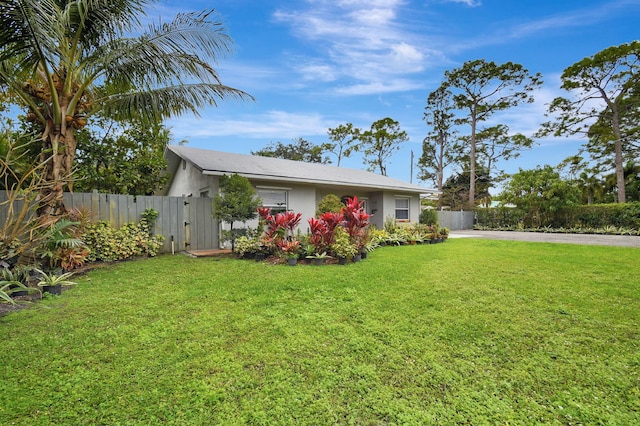 exterior space with a front lawn