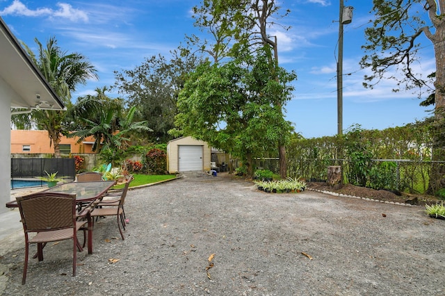 view of patio featuring a storage shed