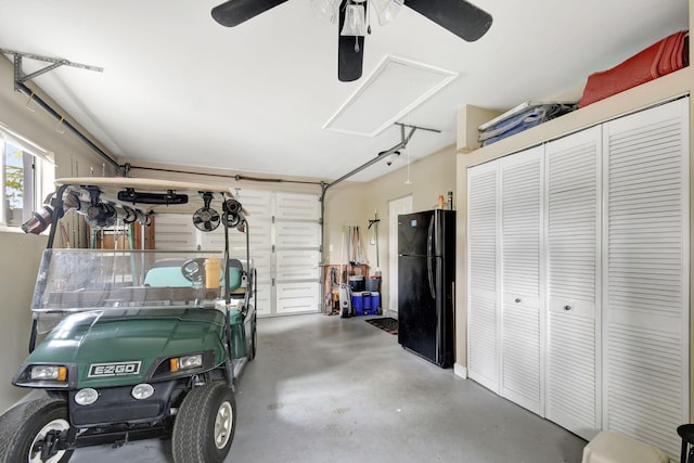 garage featuring ceiling fan and black fridge