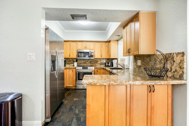 kitchen with ornamental molding, a textured ceiling, tasteful backsplash, kitchen peninsula, and stainless steel appliances