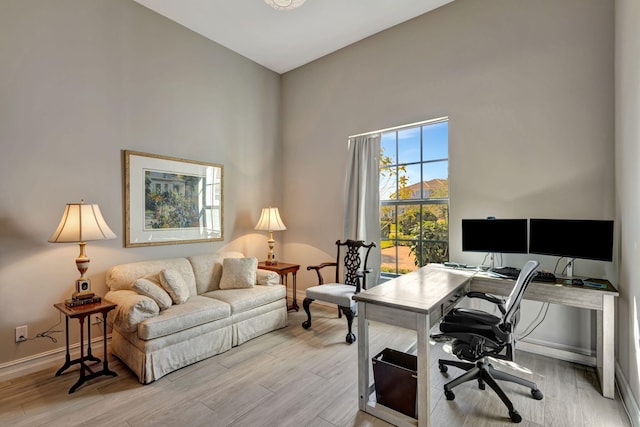 office area featuring light wood-type flooring