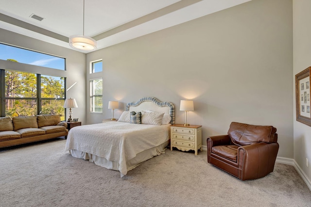 bedroom with light carpet