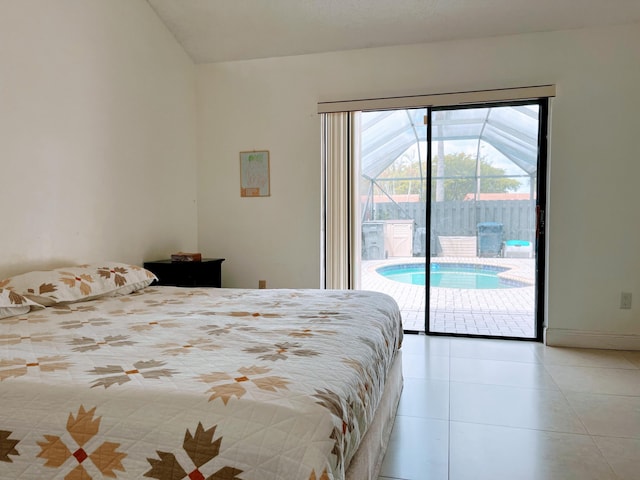 tiled bedroom featuring vaulted ceiling and access to exterior