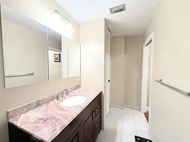 bathroom featuring vanity and tile patterned floors