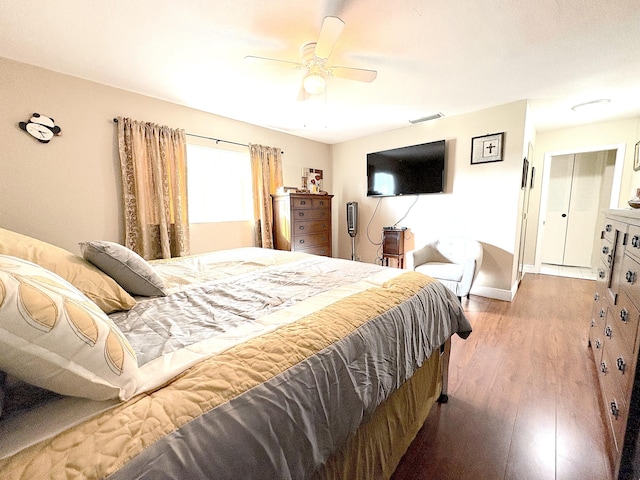 bedroom featuring ceiling fan and wood-type flooring