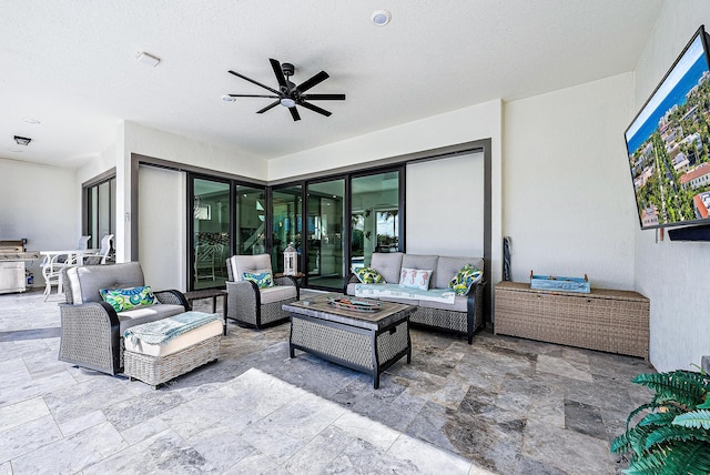 view of patio featuring ceiling fan and outdoor lounge area