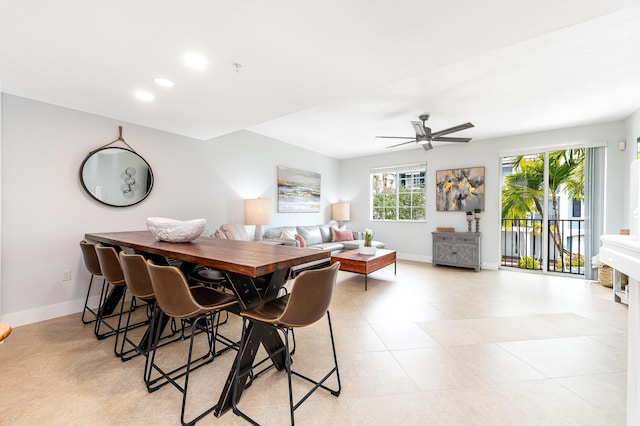 dining room featuring ceiling fan