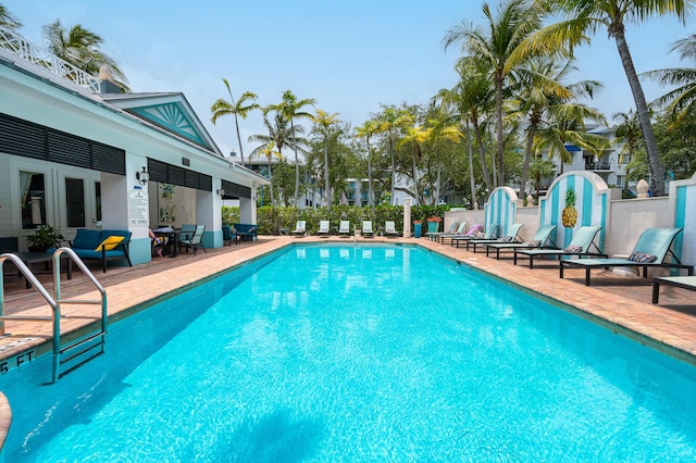 view of swimming pool with a patio