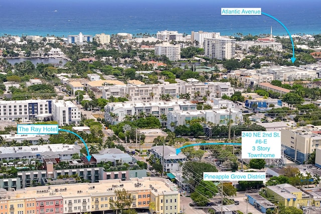 drone / aerial view with a water view