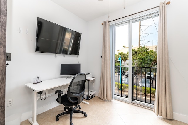 office area with light tile patterned flooring