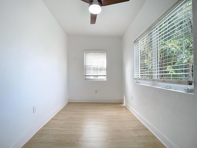 empty room featuring light hardwood / wood-style floors and ceiling fan