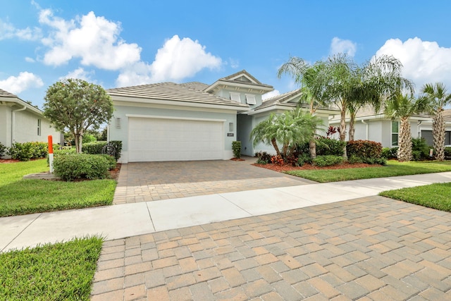 view of front of property with a garage