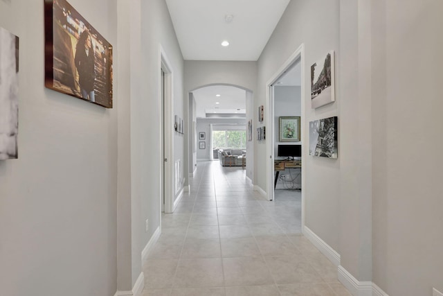 hallway with light tile patterned floors