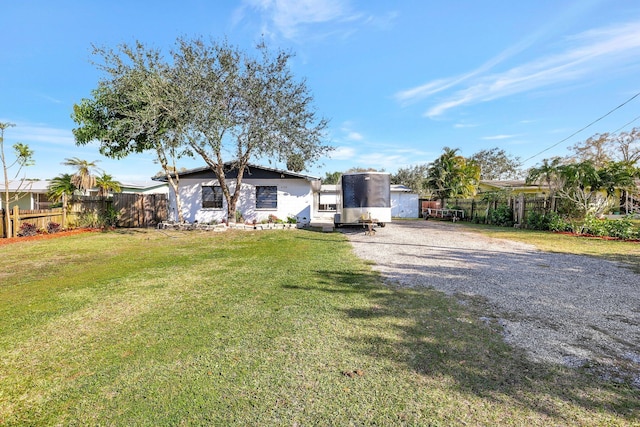 view of front of home with a front lawn