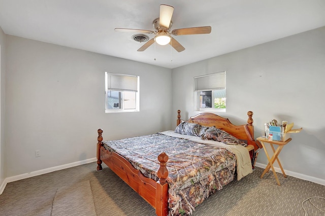 carpeted bedroom featuring ceiling fan