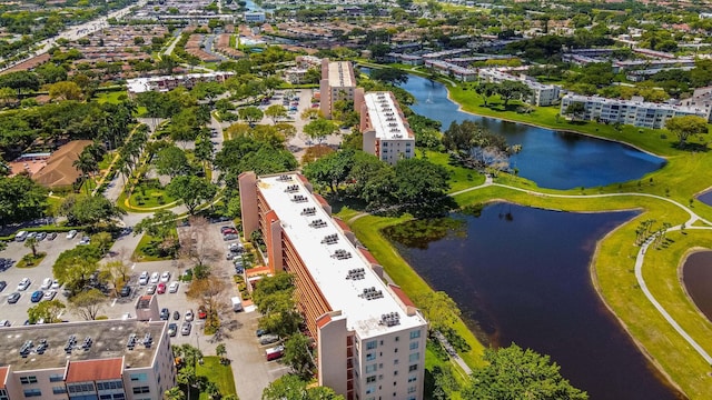 drone / aerial view with a water view