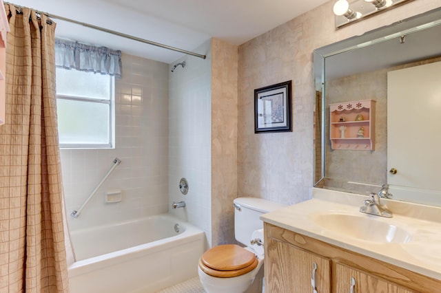 full bathroom featuring vanity, toilet, and shower / bath combo with shower curtain