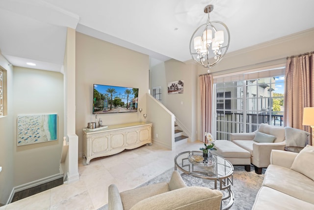 living room featuring ornamental molding and a chandelier