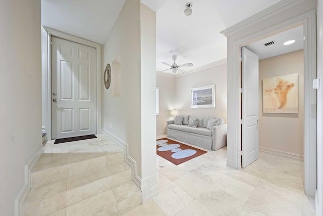 hallway with crown molding