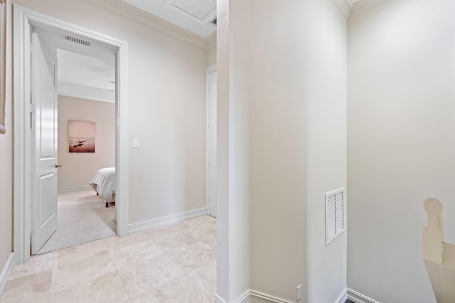 hallway featuring ornamental molding