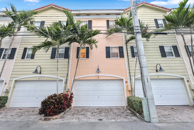 view of front of home with a garage