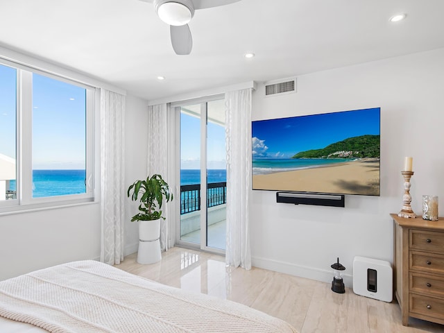 bedroom featuring ceiling fan and access to outside