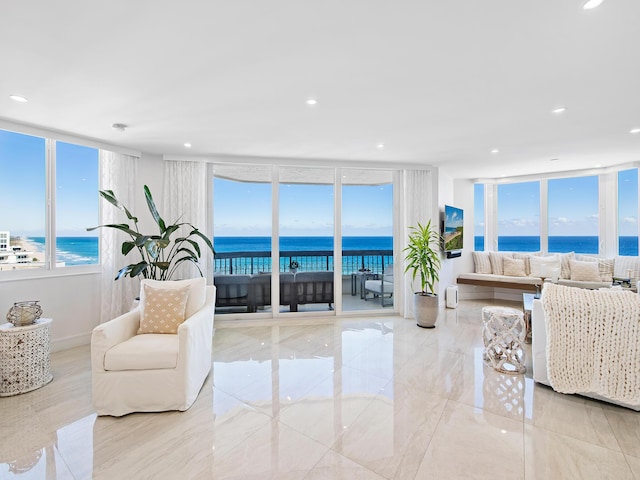 living room featuring a water view