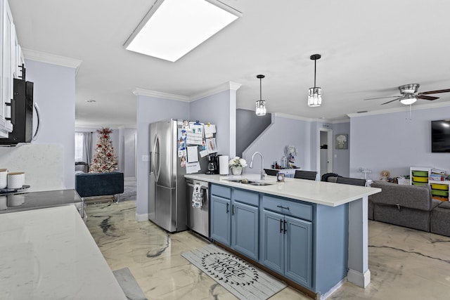 kitchen featuring appliances with stainless steel finishes, ornamental molding, and sink