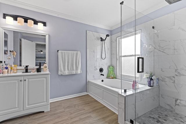 bathroom with crown molding, hardwood / wood-style floors, plus walk in shower, and vanity