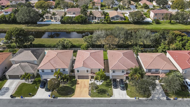 drone / aerial view with a water view