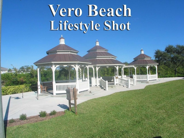 view of property's community featuring a gazebo and a lawn