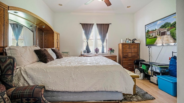 bedroom featuring ceiling fan and light wood-type flooring