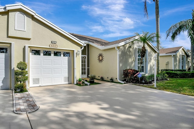 ranch-style house with a garage